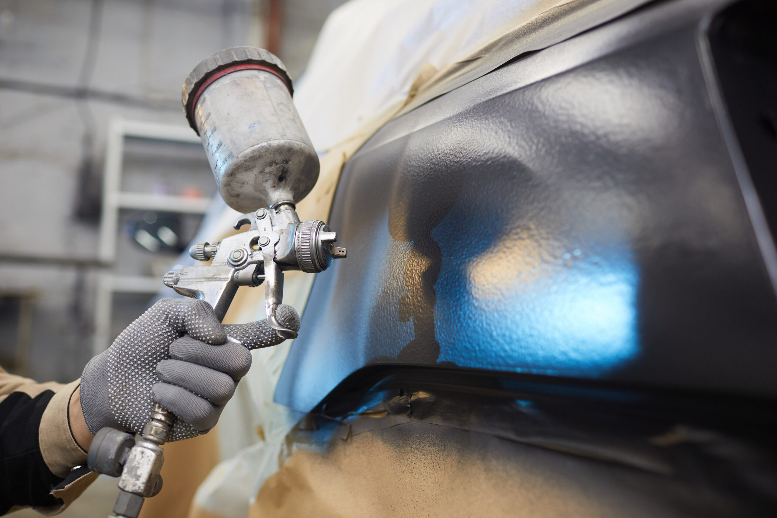 auto refinishing applying paint with spray gun 2026 01 08 00 15 46 utc